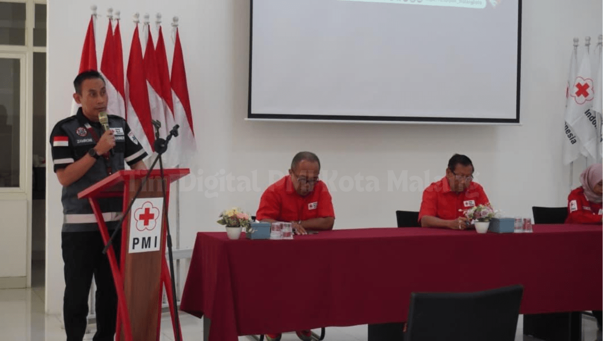 Penyampaian laporan Ketua Panitia Pelatihan Ambulans PMI Balige